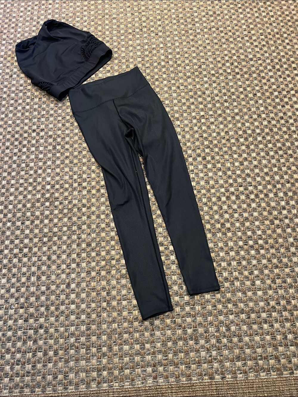 Carbon set in black top is small pants are medium